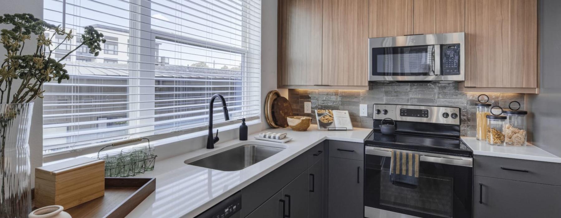 a kitchen with a stove and oven