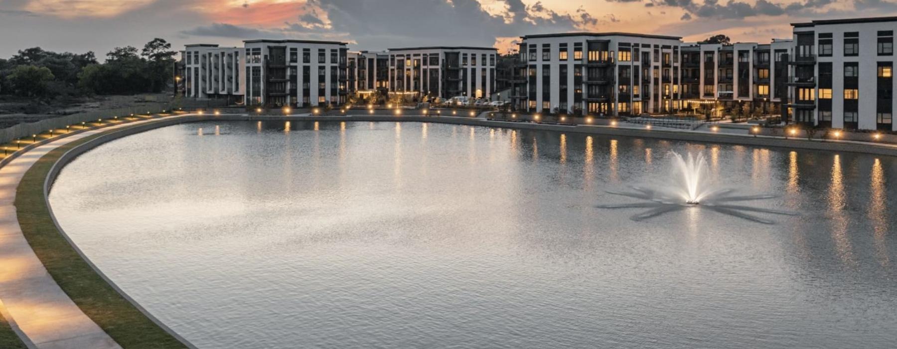 a body of water with buildings along it